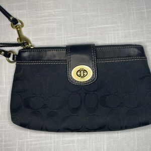COACH turn lock signature C logo canvas and leather black mini bag. EUC